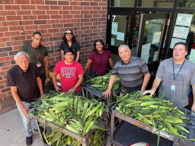 Volunteers and staff at Pillsbury United Communities in the Seward Neighborhood with fresh Sweet Corn